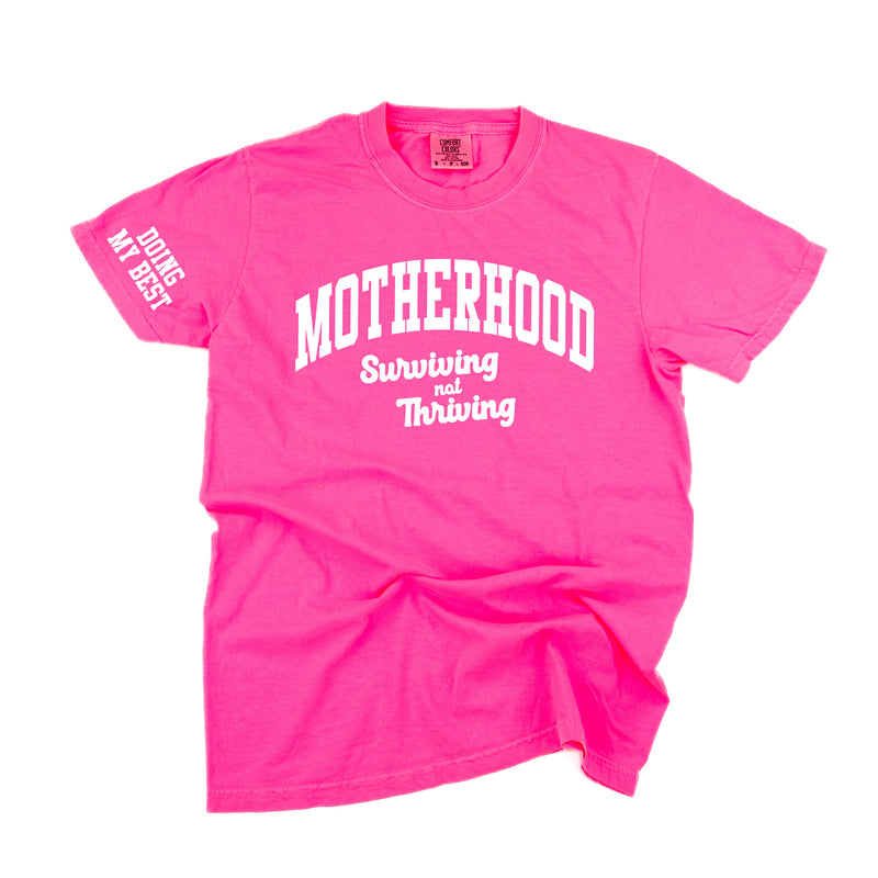 MOTHERHOOD - SURVIVING NOT THRIVING - DOING MY BEST - (Our 2024 Mantra) - Colors - LMSS® EXCLUSIVE - Short Sleeve Comfort Colors Tee