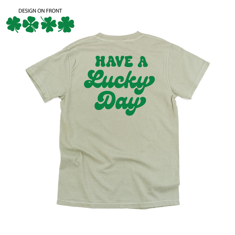 4 Shamrocks Across (Front) w/ Have a Lucky Day (Back) - SHORT SLEEVE COMFORT COLORS TEE