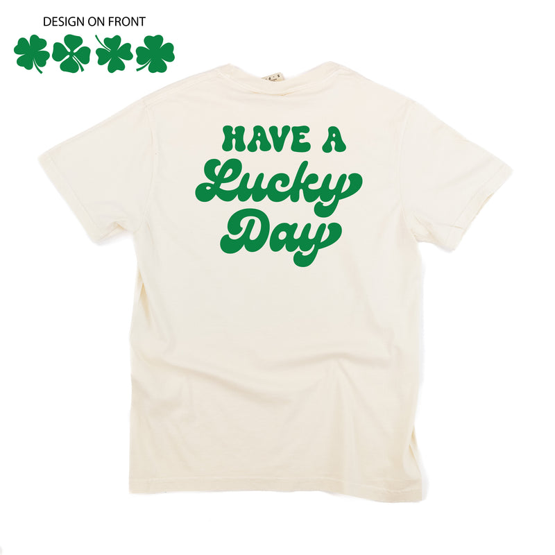 4 Shamrocks Across (Front) w/ Have a Lucky Day (Back) - SHORT SLEEVE COMFORT COLORS TEE