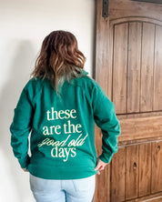 Green adult quarter zip with 'these are the good old days' printed on the back, seen on model - Little Mama Shirt Shop