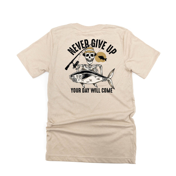 Fishing Skelly Pocket Design on Front w/ Never Give Up on Back - Unisex Tee
