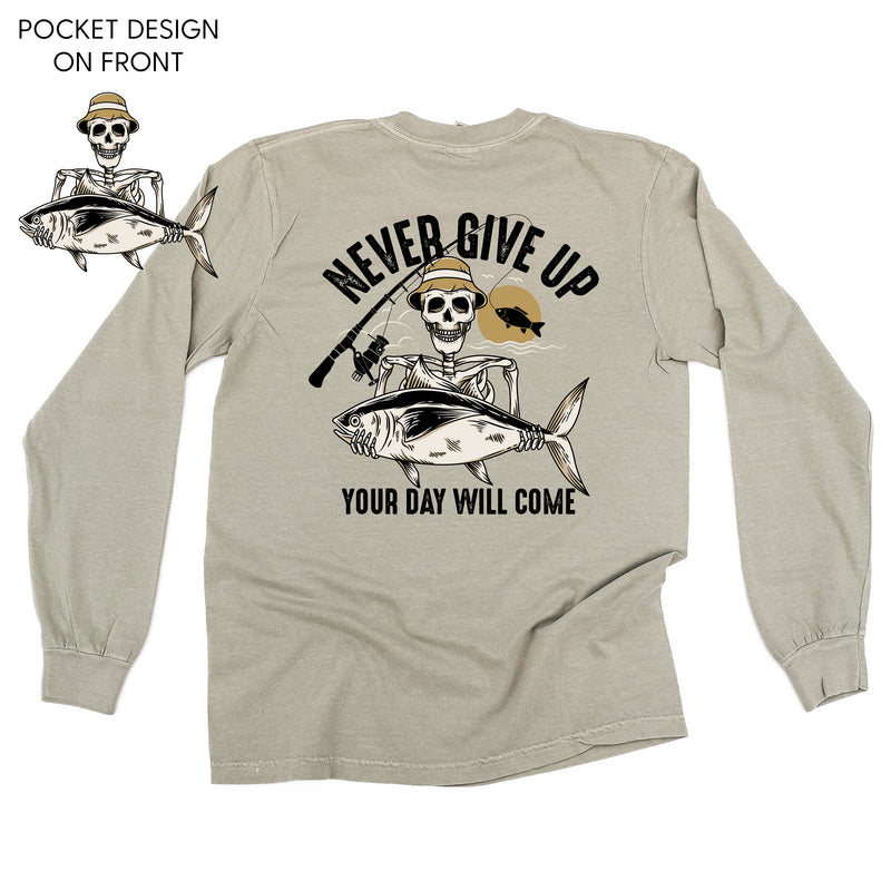 Fishing Skelly Pocket Design on Front w/ Never Give Up on Back - LONG SLEEVE COMFORT COLORS TEE