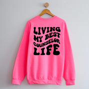 Living My Best Counselor Life - Melty Smiley (pf & b) - BASIC Fleece Little Mama Shirt Shop LLC