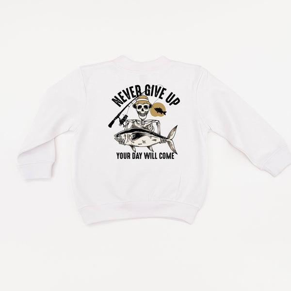 Fishing Skelly Pocket Design on Front w/ Never Give Up on Back - Child Sweater