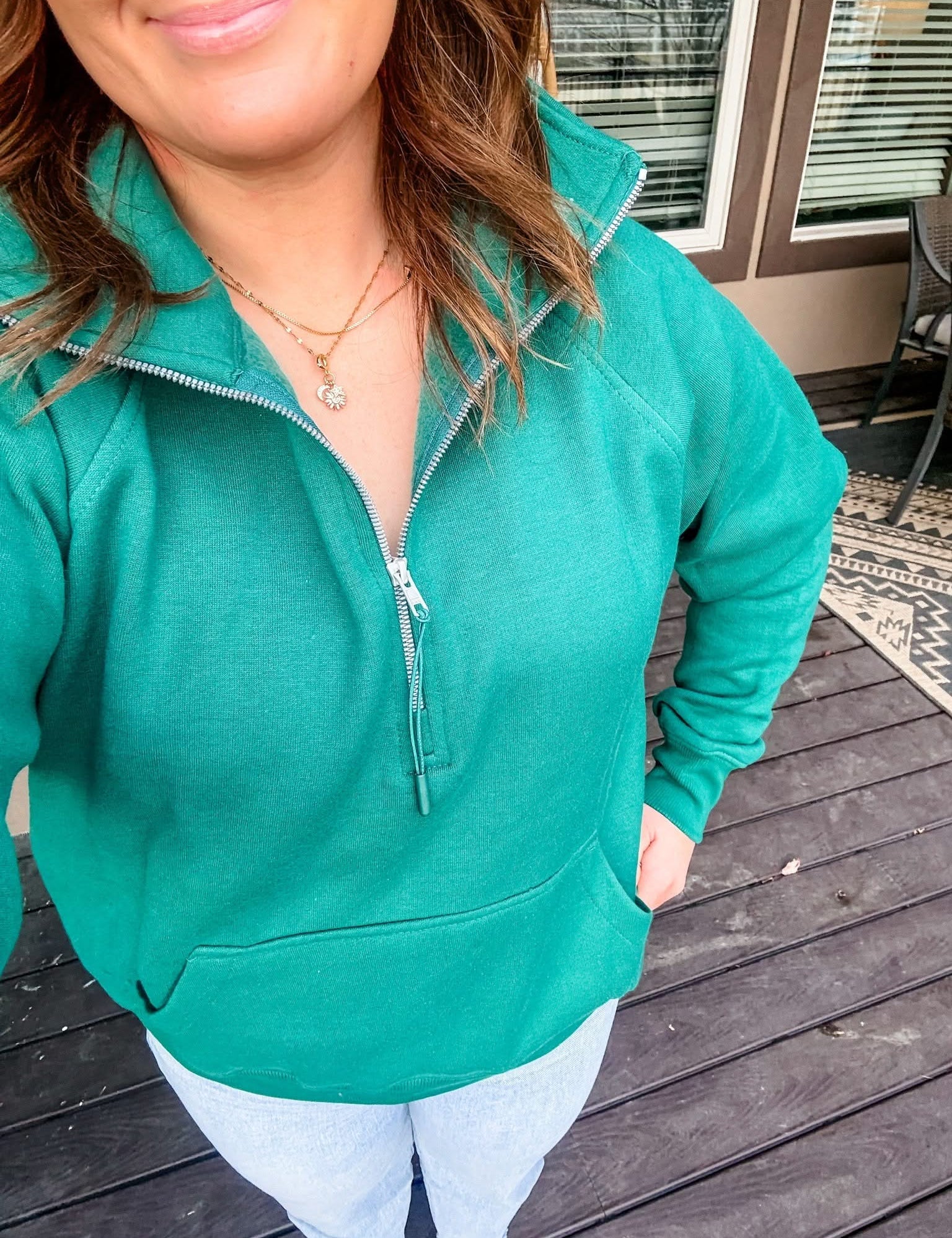 Green adult quarter zip, seen on model - Little Mama Shirt Shop