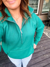 Green adult quarter zip, seen on model - Little Mama Shirt Shop