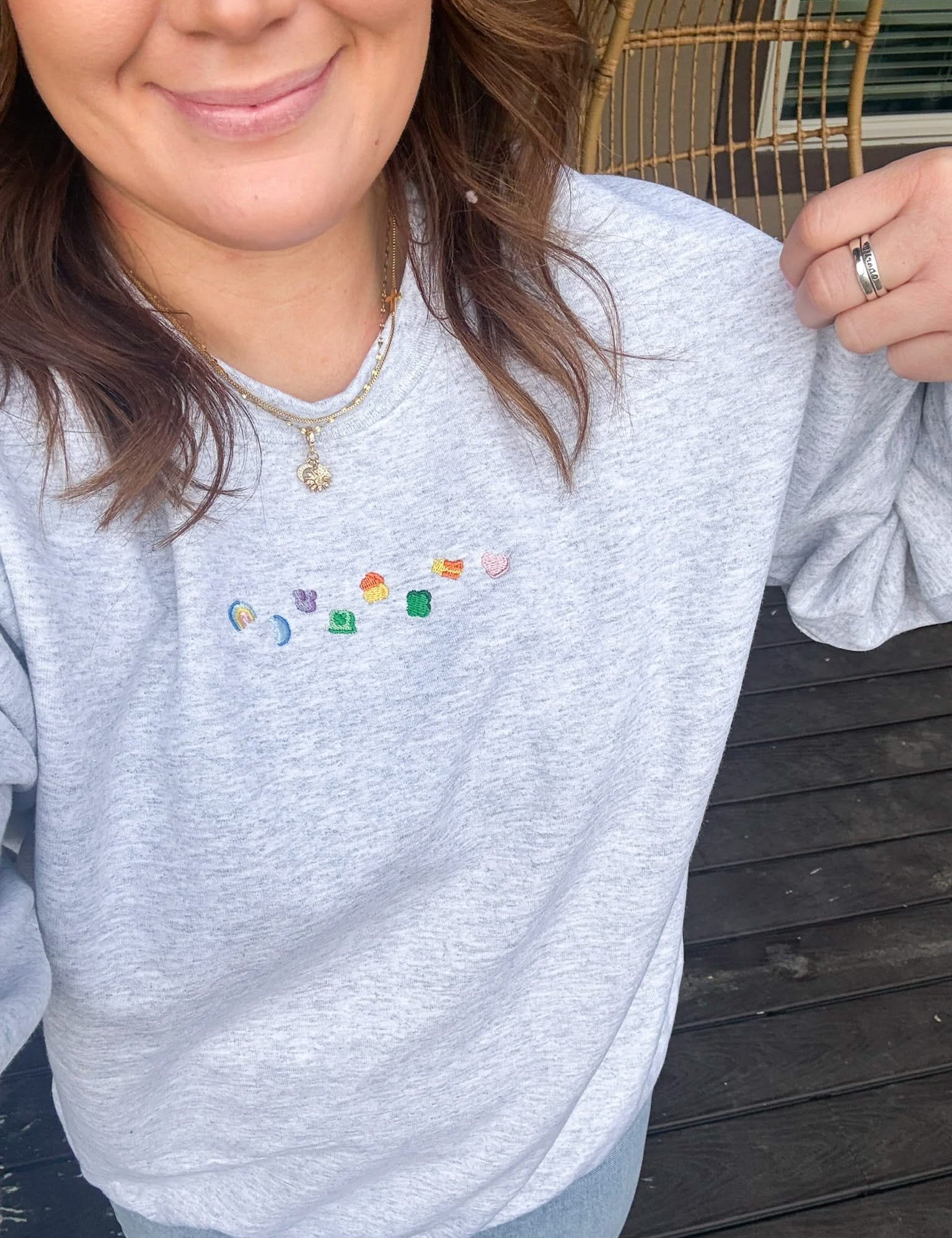 Ash adult basic fleece with lucky charm marshmallows embroidered on chest, seen on model - Little Mama Shirt Shop