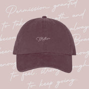 Maroon hat with cream embroidery "Mother", seen on flat lay - Little Mama Shirt Shop
