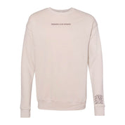 Dust crewneck with "Permission To Be Optimistic" on chest and permission to be paragraph printed on sleeve, shown on flat lay - Little Mama Shirt Shop