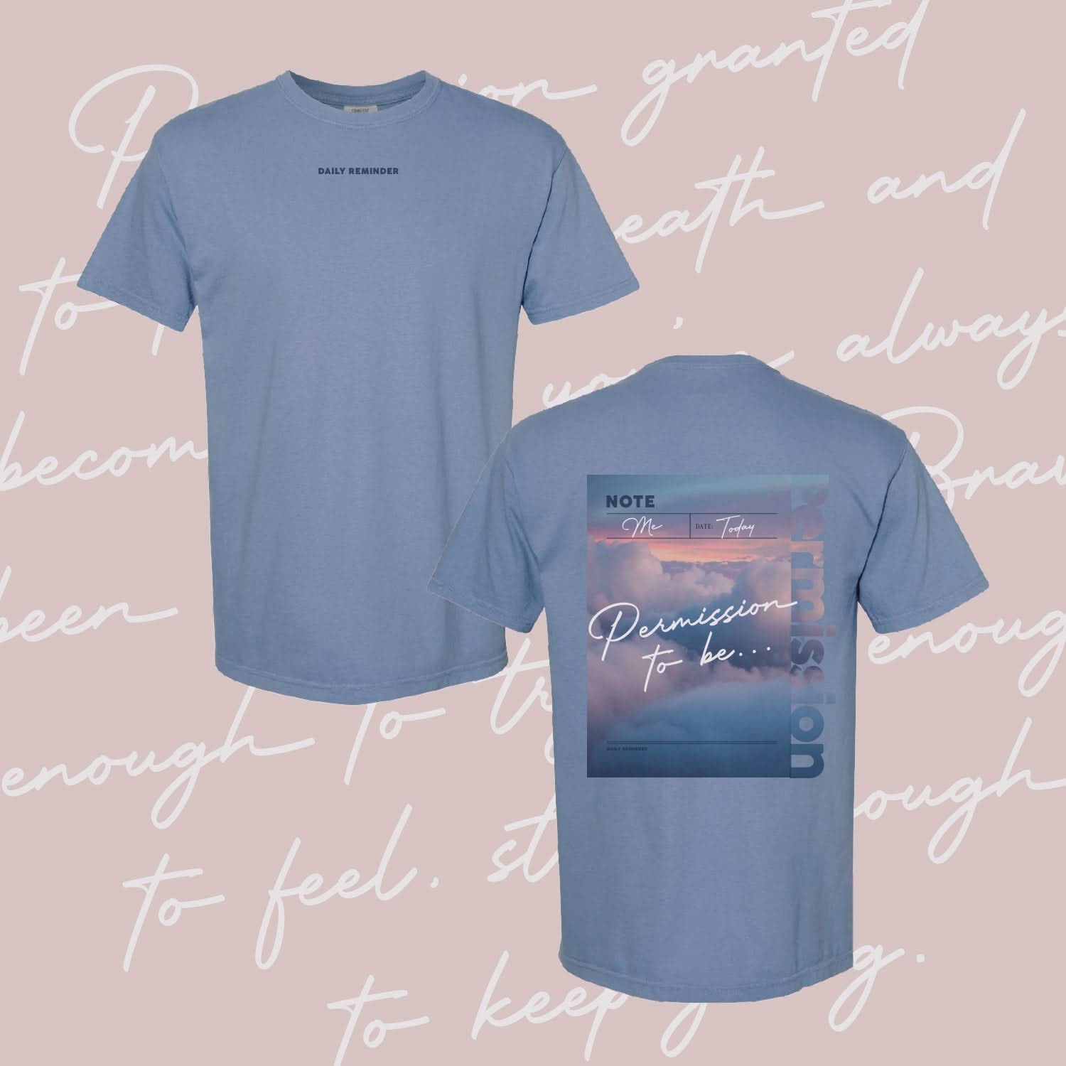 Washed denim comfort colors tee with permission to be cloud graphic on back and 'daily reminder' printed on front, seen on flat lay - Little Mama Shirt Shop