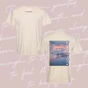 Ivory comfort colors tee with permission to be cloud graphic on back and 'daily reminder' printed on front, seen on flat lay - Little Mama Shirt Shop