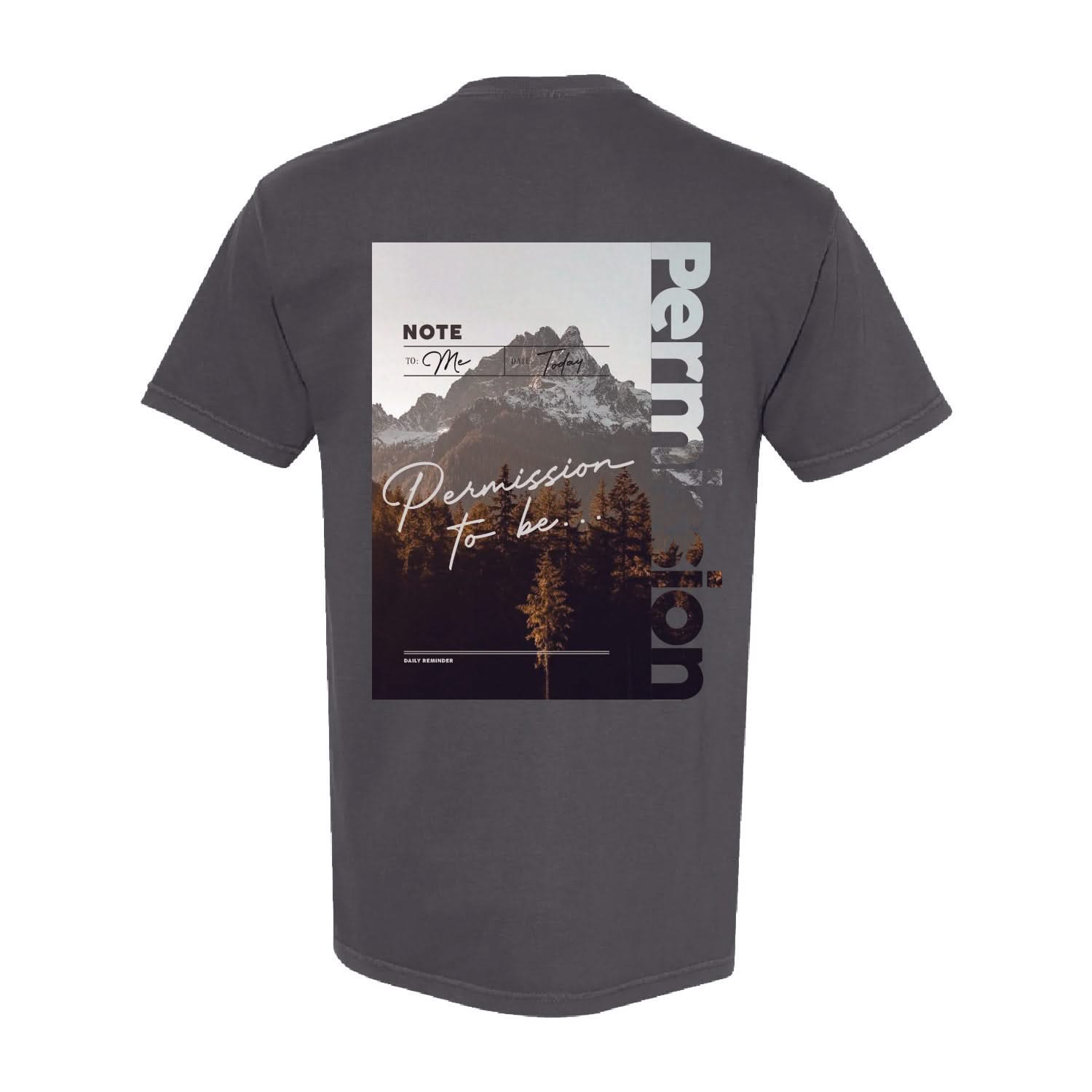 Pepper comfort colors tee with permission to be mountain graphic on back, seen on flat lay - Little Mama Shirt Shop