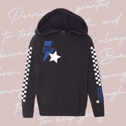 Child black sweater with checkers pattern on arm, and blue lightning bolt with 'be you' in it flanked by a white star, seen on model - Little Mama Shirt Shop