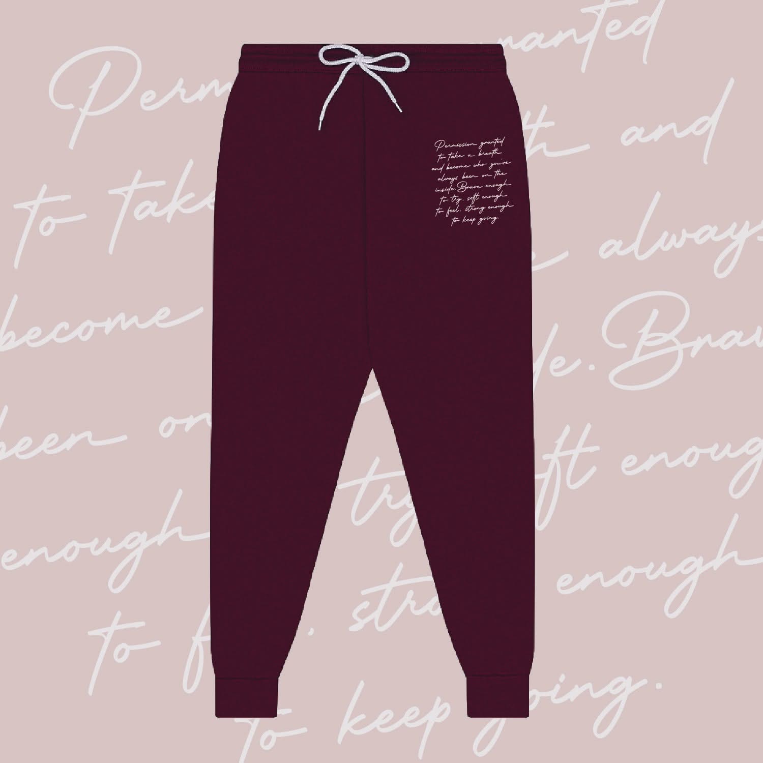 Maroon joggers with permission to be paragraph printed on leg, shown on flat lay - Little Mama Shirt Shop