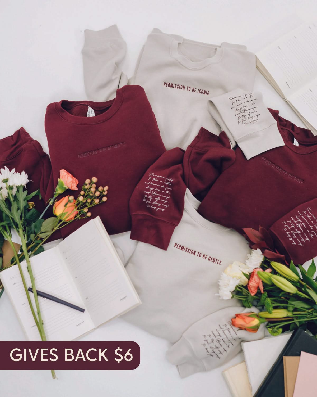 Maroon and dust crewnecks with "Permission To Be (Choose Your Word)" on chest and permission to be paragraph on sleeve, shown on flat lay - Little Mama Shirt Shop
