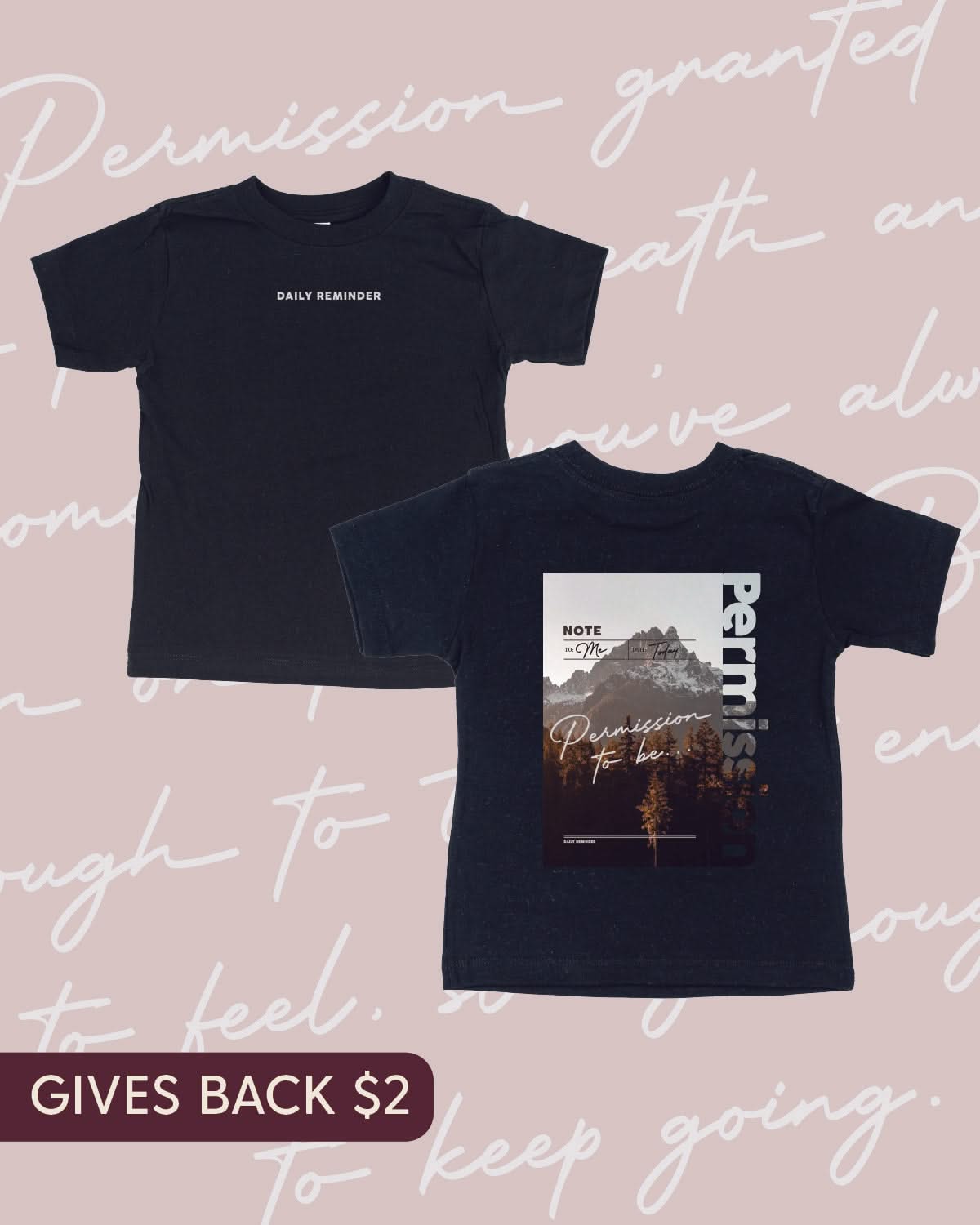 Black child tee with permission to be mountain graphic on back and 'daily reminder' printed on front, seen on flat lay - Little Mama Shirt Shop