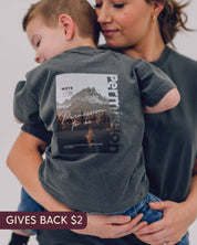 Pepper child comfort colors tee with permission to be mountain graphic on back, seen on model - Little Mama Shirt Shop