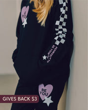 Child black sweater and joggers with checkers pattern on arm and leg, and Purple Heart with 'be you' in it flanked by a white star, seen on model - Little Mama Shirt Shop