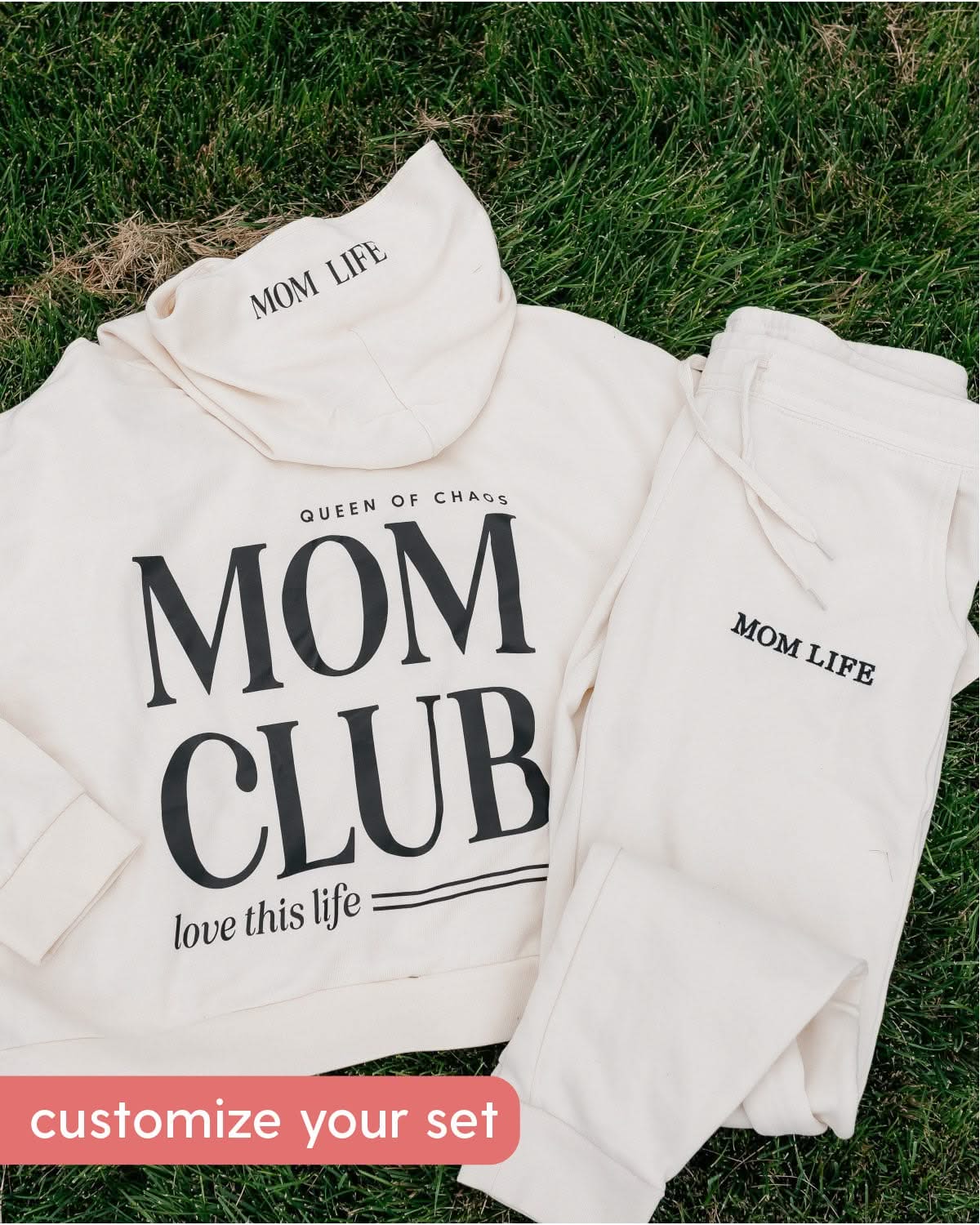 Hoodie and jogger set in bone with black 'Mom Club' graphic on flat lay - Little Mama Shirt Shop