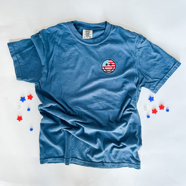 Embroidered Short Sleeve Comfort Colors Tee -  Star Eye Smiley Flag (2024 Version)