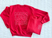 Adult sweater in red with "Mom Love Club" bubble letter text design on back and front left chest small, shown on flat lay – Little Mama Shirt Shop