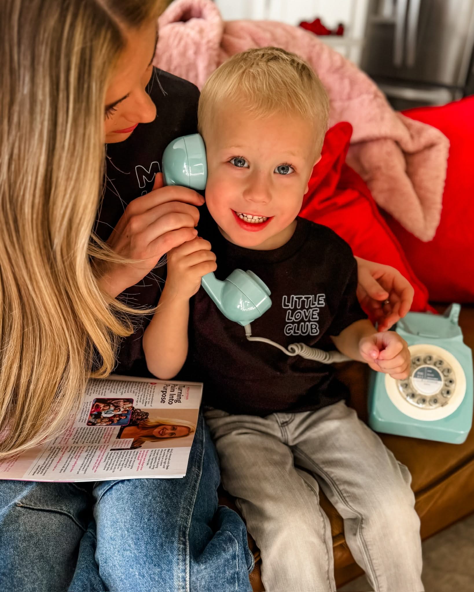 Child tee in black with "Little Love Club" bubble letter text design on front left chest, shown on model – Little Mama Shirt Shop
