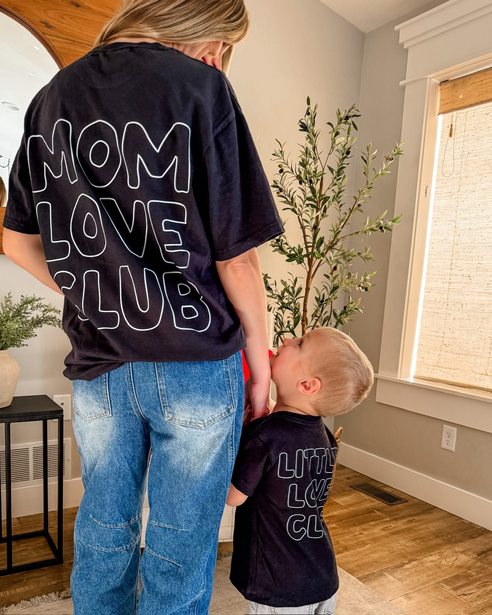 Adult and Child tee in black with "Little Love Club" and "Mom Love Club" bubble letter text design on back, shown on models – Little Mama Shirt Shop