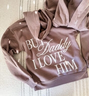 Adult hoodie in brown with "But Daddy I Love Him" design on back and "loml" script on hood, shown on flat lay – Little Mama Shirt Shop