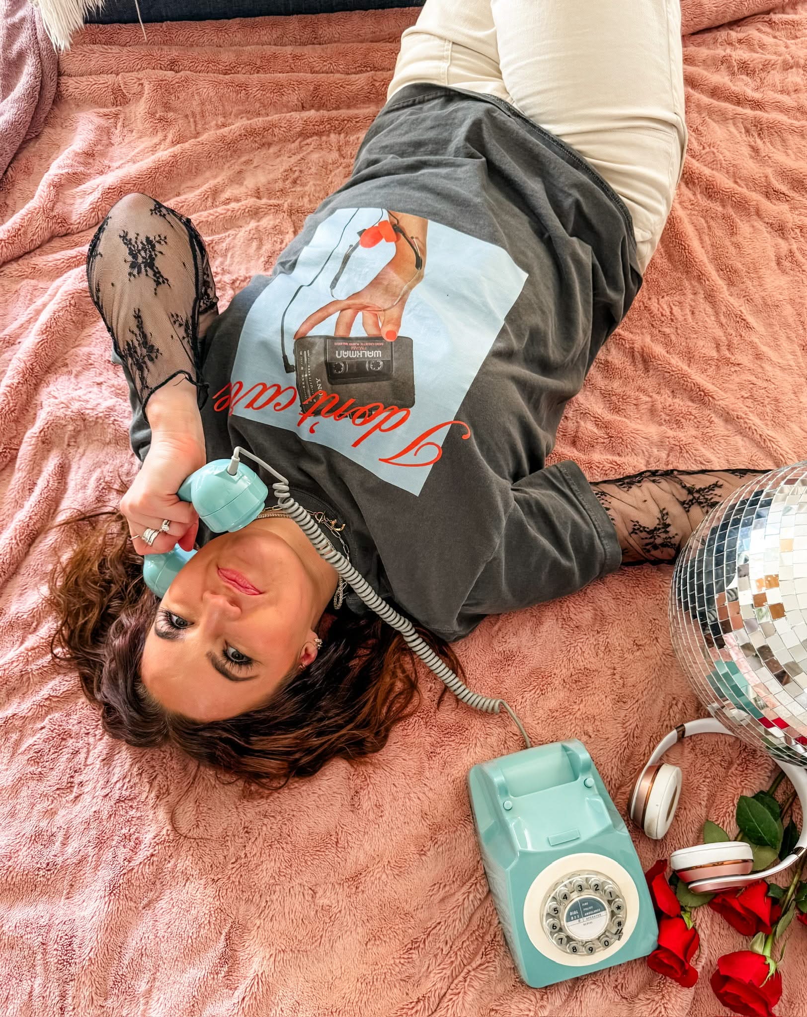 Adult tee with "I Don't Care" retro cassette on front and "JK I Actually Do" text on sleeve, shown on model  – Little Mama Shirt Shop