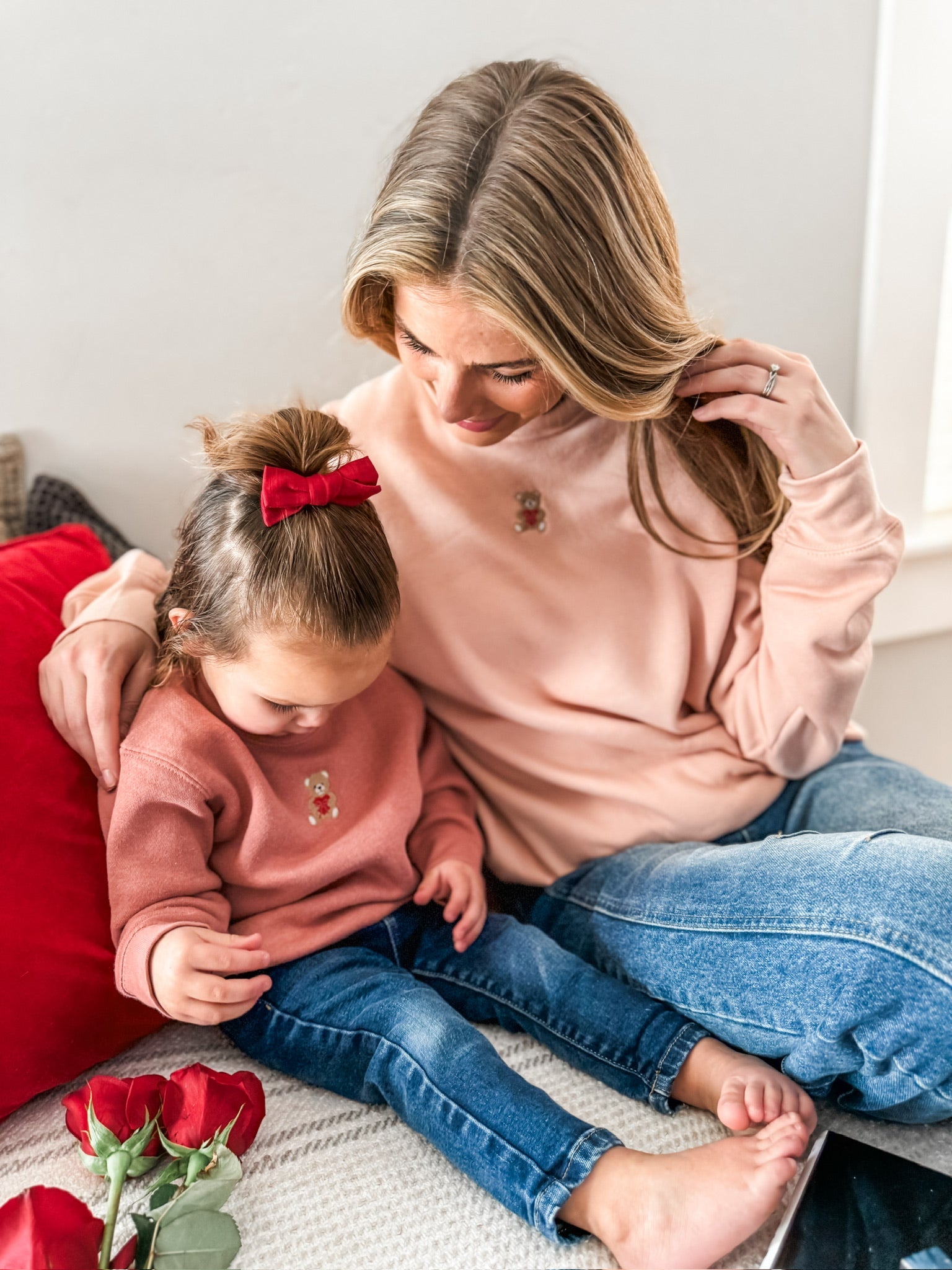 Child mauvelous and Adult pink sweaters with valentine's teddy Embroidery on front, shown on models  – Little Mama Shirt Shop