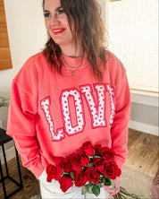 Adult mock neck in pink with "LOVE" heart design on front, shown on model – Little Mama Shirt Shop