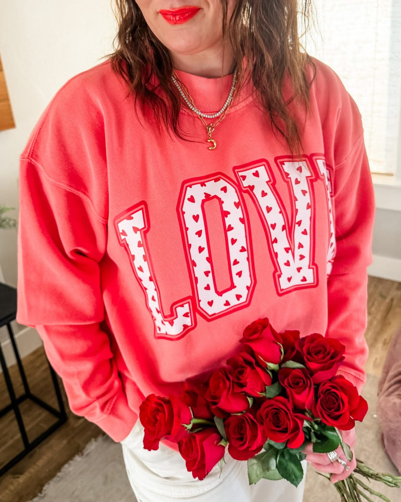 Adult mock neck in pink with "LOVE" heart design on front, shown on model – Little Mama Shirt Shop