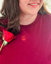 Adult tee in maroon with mini symbol cherry design on front, shown on model – Little Mama Shirt Shop