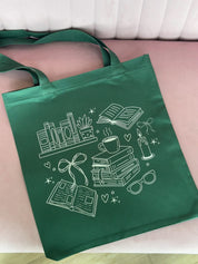 green book tote shown on flat lay – Little Mama Shirt Shop