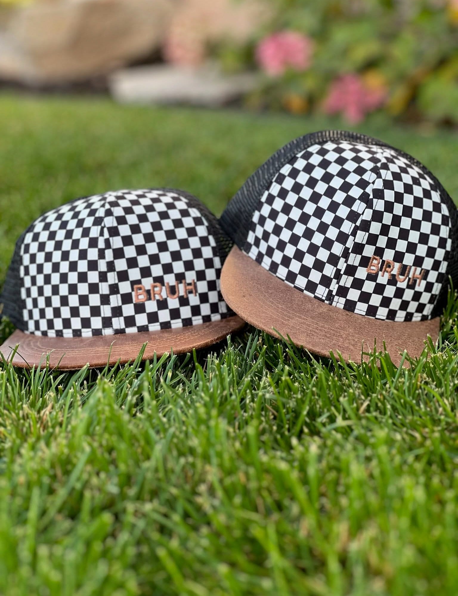 Child hat in brown and checkered with "Bruh" embroidered design, seen on flat lay - Little Mama Shirt Shop