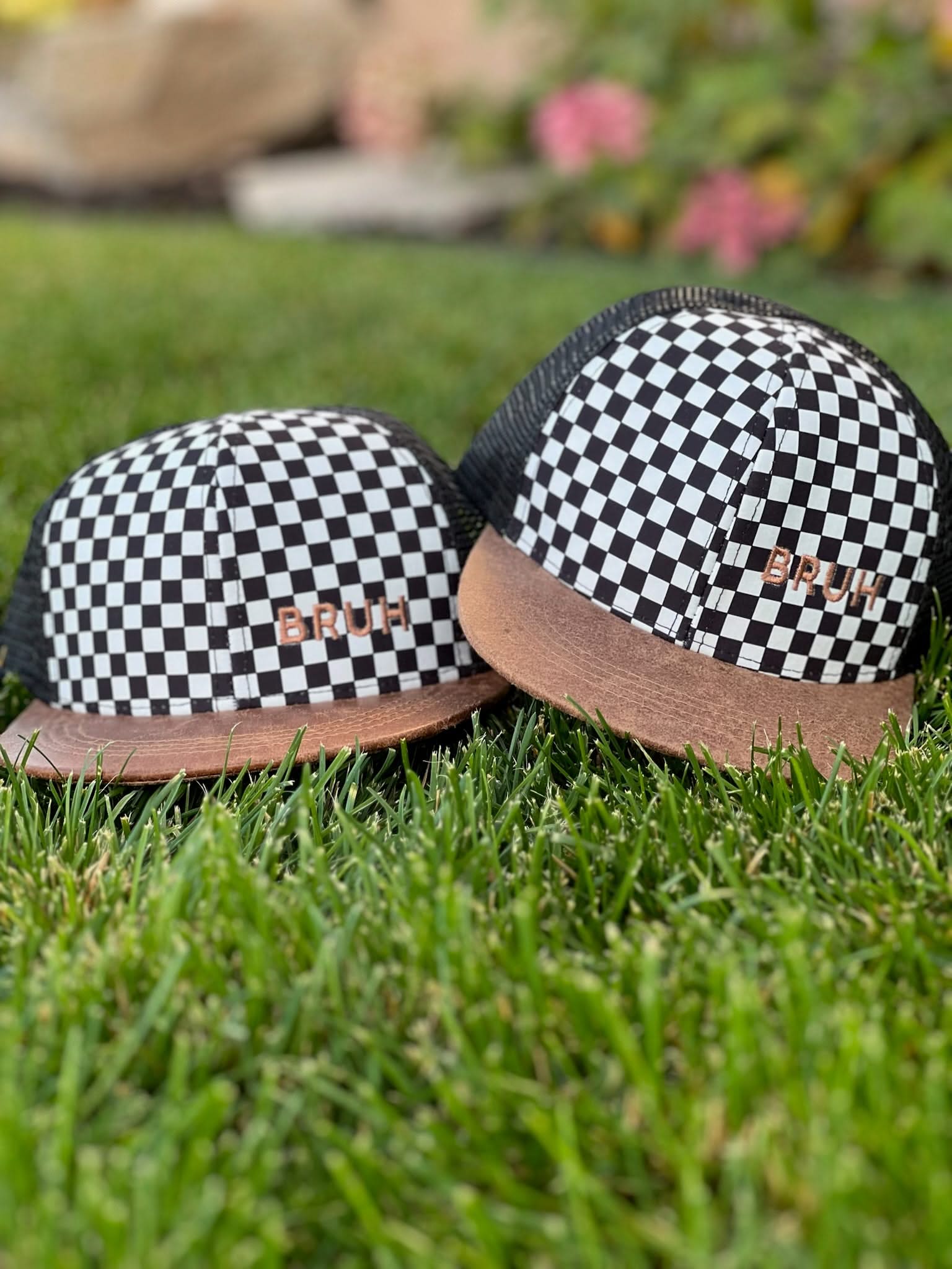 Child hat in brown and checkered with "Bruh" embroidered design, seen on flat lay - Little Mama Shirt Shop