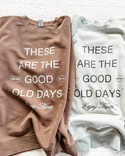 Adult pigment crewneck in brown and sage with 'these are the good old days'  printed on the front, seen on flat lay - Little Mama Shirt Shop