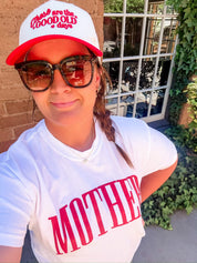 White adult comfort colors tee with red 'mother' puff print across the front, seen on model - Little Mama Shirt Shop