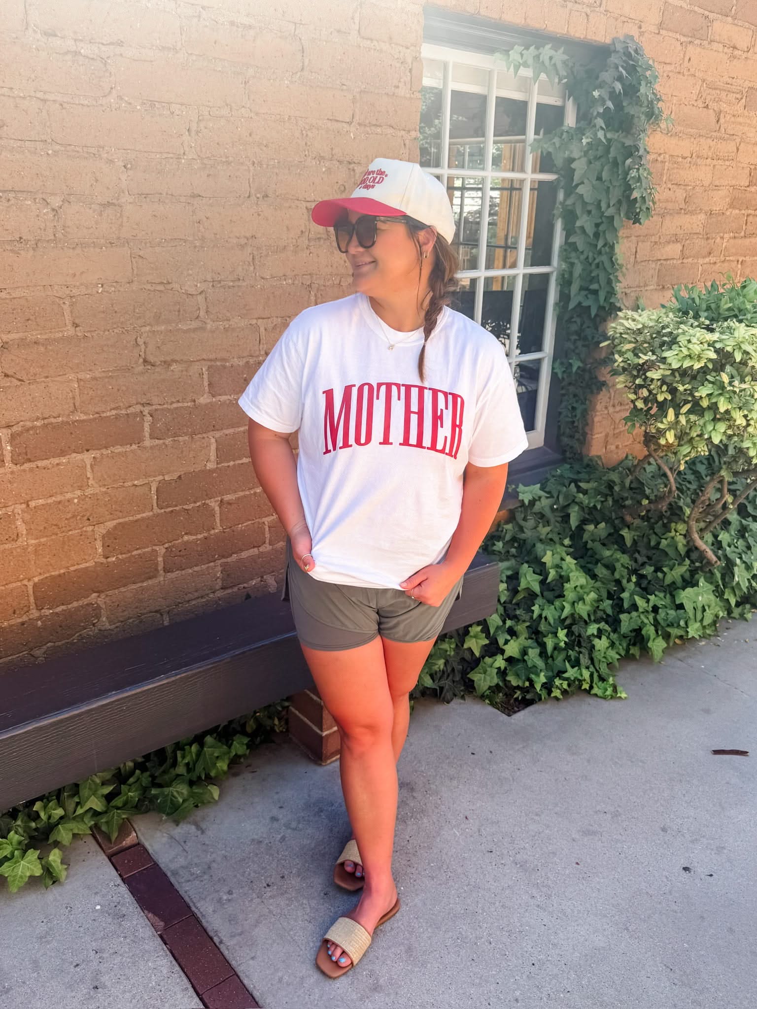 White adult comfort colors tee with red 'mother' puff print across the front, seen on model - Little Mama Shirt Shop