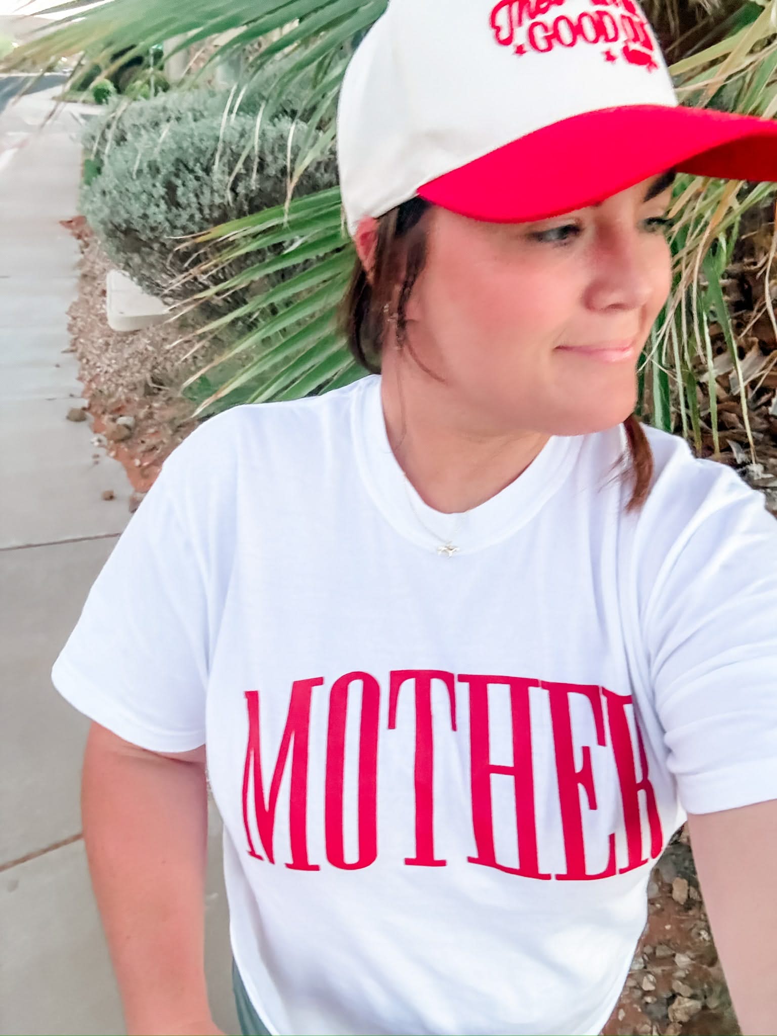 White adult comfort colors tee with red 'mother' puff print across the front, seen on model - Little Mama Shirt Shop