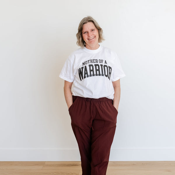 Mother of a Warrior - Varsity - SHORT SLEEVE COMFORT COLORS TEE