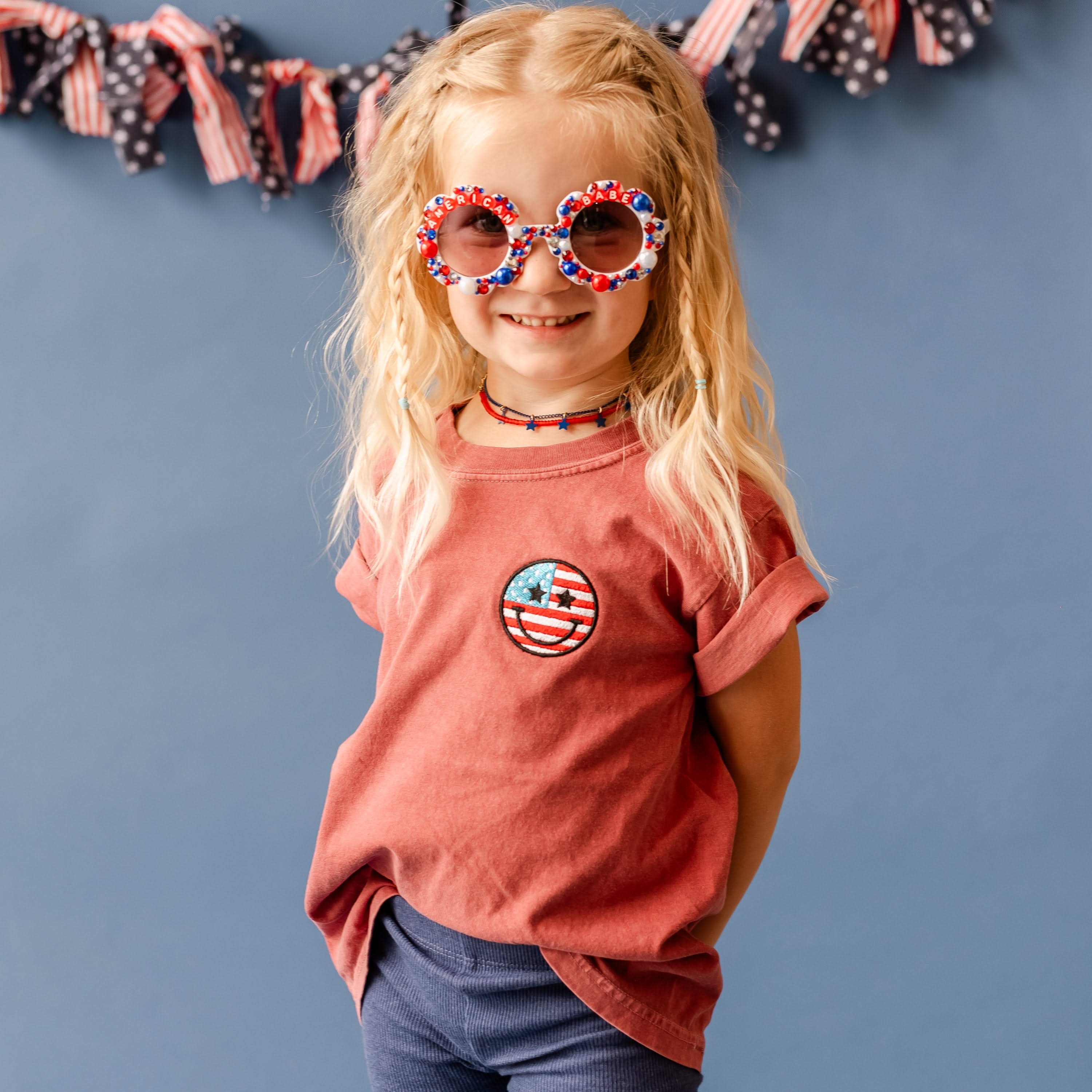 Embroidered YOUTH Comfort Colors Tee - Star Eye Smiley Flag (pocket) Little Mama Shirt Shop