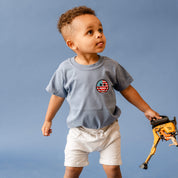 Embroidered YOUTH Comfort Colors Tee - Star Eye Smiley Flag (pocket) Little Mama Shirt Shop