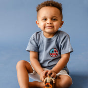 Embroidered YOUTH Comfort Colors Tee - Star Eye Smiley Flag (pocket) Little Mama Shirt Shop