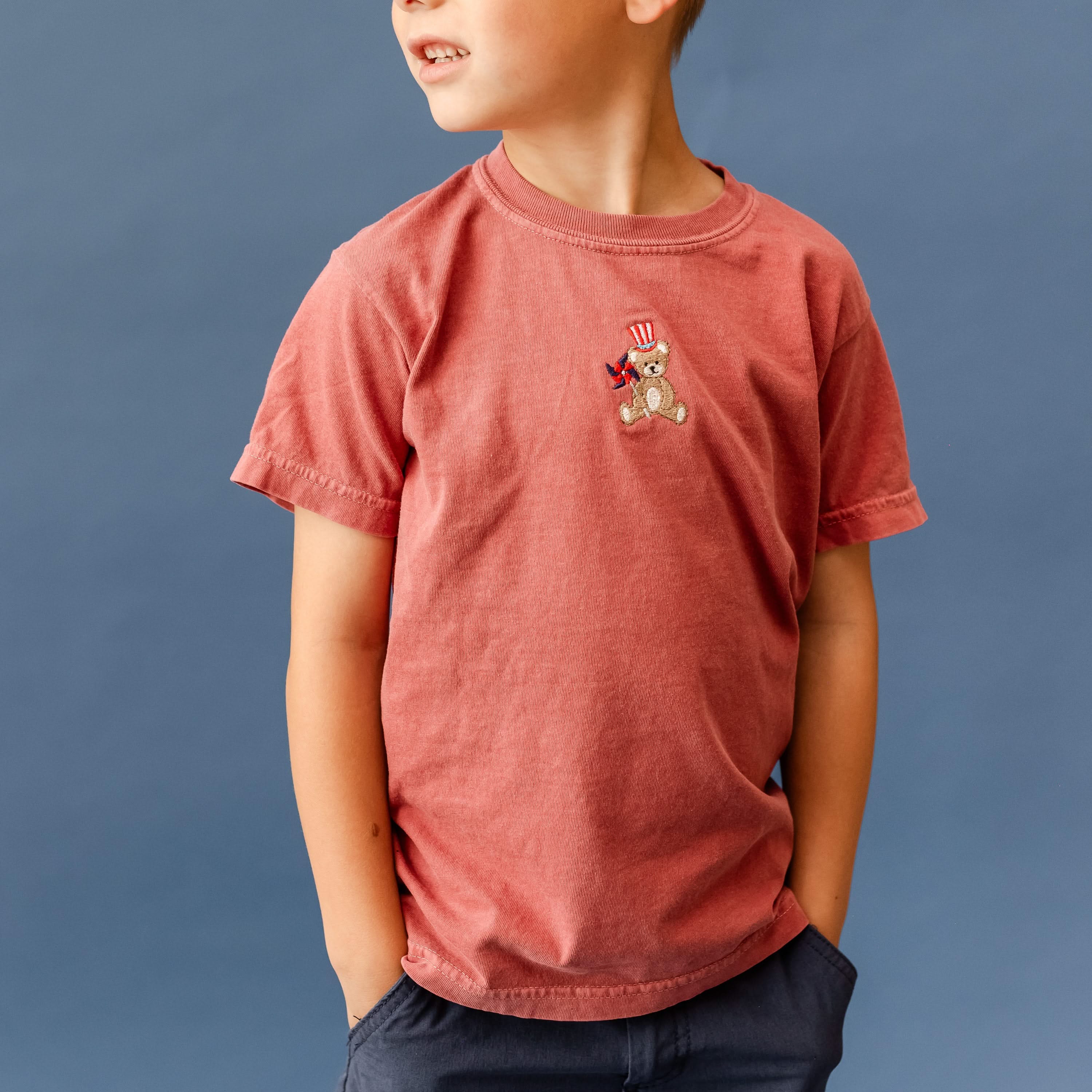 Embroidered YOUTH Comfort Colors Tee - Teddy with Patriotic Top Hat and Pinwheel (center) Little Mama Shirt Shop
