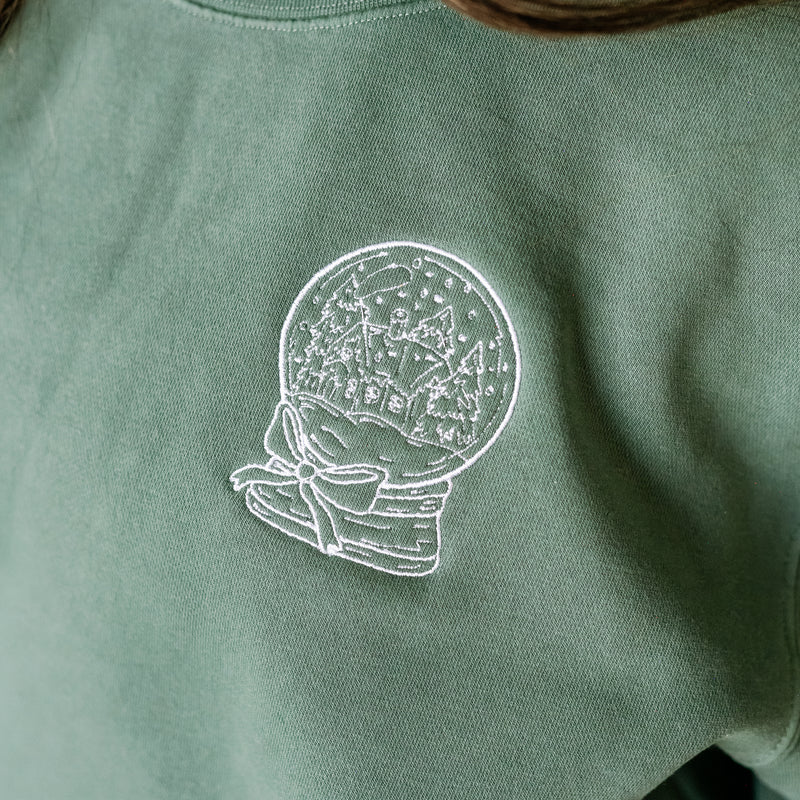 Embroidered Pocket Snowglobe w/ There's No Place Like Home on Back - Pigment Crewneck Sweatshirt