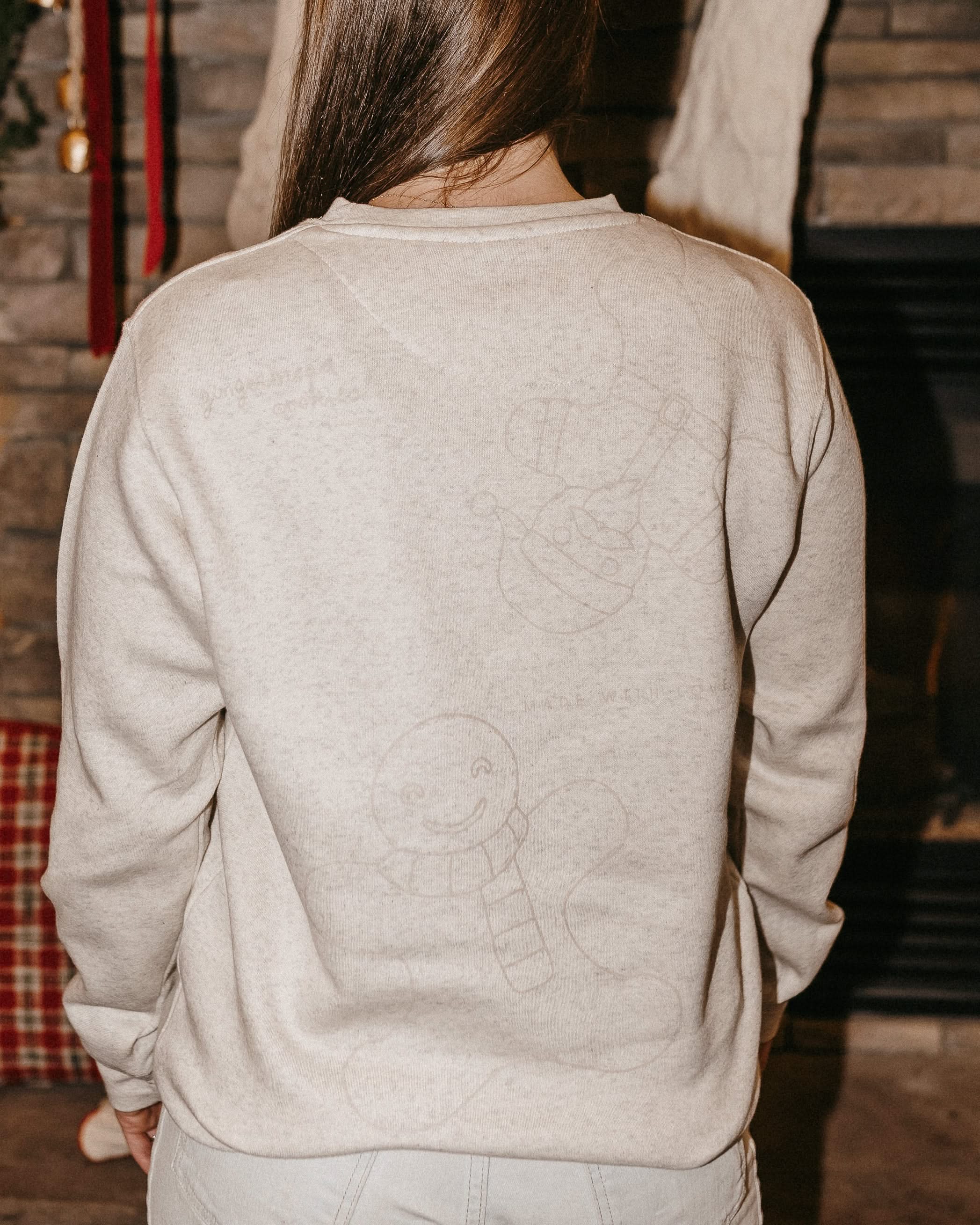 Adult fleece in natural with printed ginger bread family pattern, shown on model – Little Mama Shirt Shop