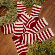 Adult socks in red and white thin stripes, shown on flat lay – Little Mama Shirt Shop