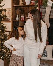 Adult and child fleece in natural with printed ginger bread family pattern, shown on model – Little Mama Shirt Shop