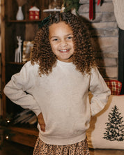 Child fleece in natural with printed ginger bread family pattern, shown on model – Little Mama Shirt Shop